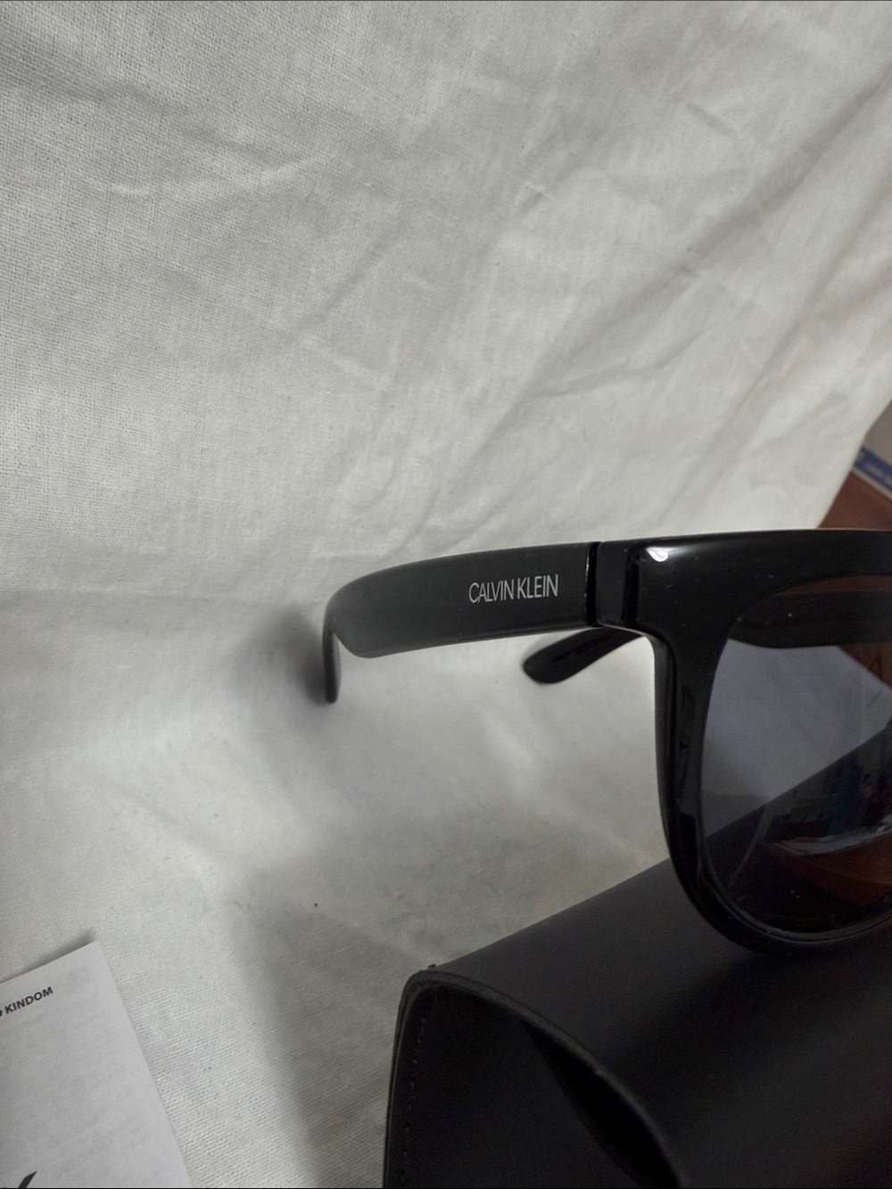 Calvin Klein Glossy Black Sunglasses with Smoke Lenses - Picture 2 of 5